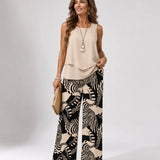 Ignacia™ beige sleeveless layered top with black-and-cream plant print wide-leg pants set