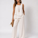Layered satin sleeveless top and wide-leg pants set, light cream, draped tiers
