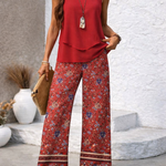 Red sleeveless layered top with floral wide-leg pants, border hem and wide cuffs