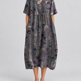 Floral print V-neck midi summer dress with short sleeves and gathered waist