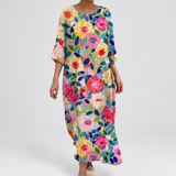 Long floral dress with elbow sleeves and relaxed fit