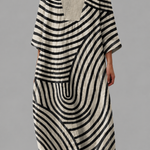 Flattering summer dress with V-neck and bold black-and-cream striped pattern, loose fit