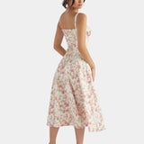 Floral pink midi dress with spaghetti straps and swingy flared skirt, back view