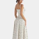 Cream floral midi dress with spaghetti straps, square neckline, gathered waist, and full skirt