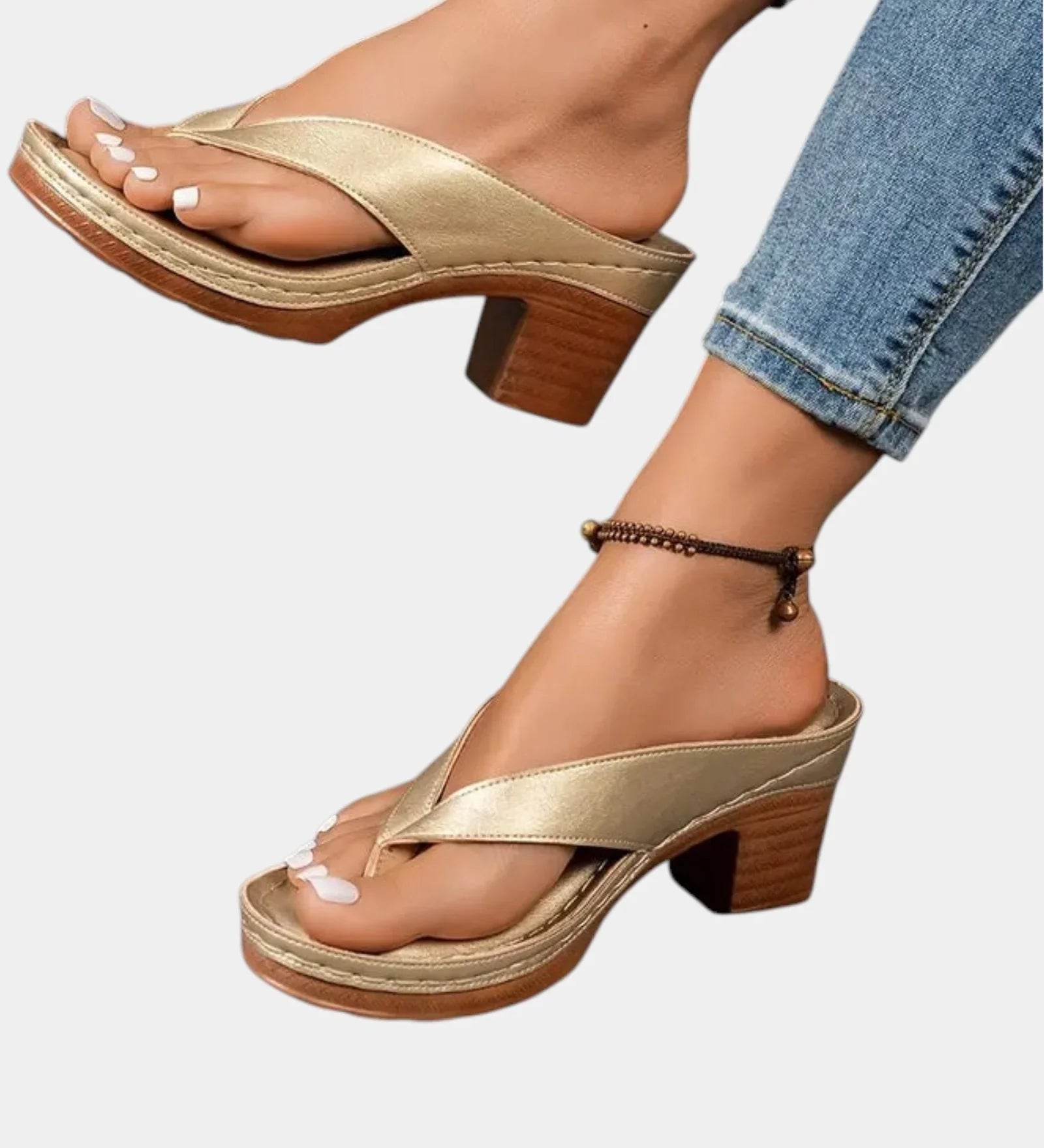 Gold T-strap sandals with open toe and thick block heel