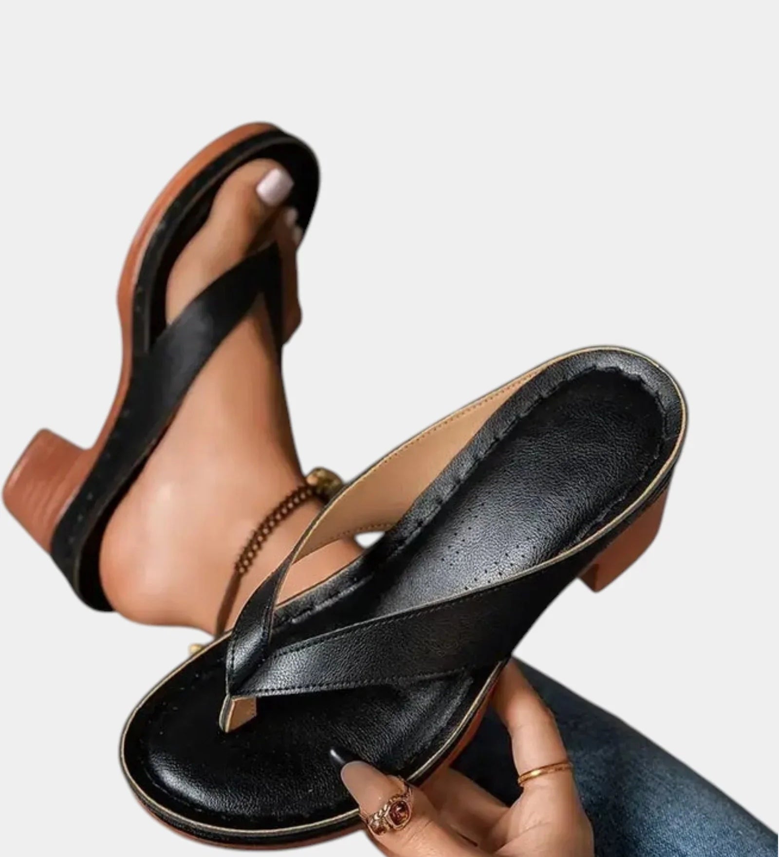 Black T-strap sandals with cushioned footbed and thick block heel