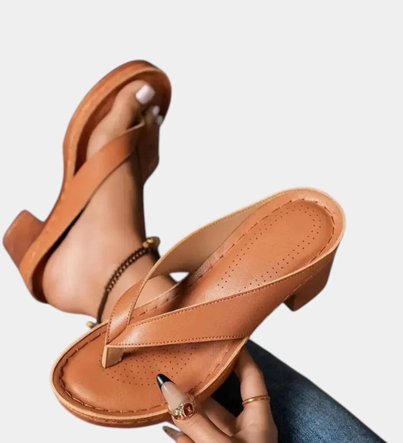 Brown T-strap sandals with cushioned footbed and thick block heel