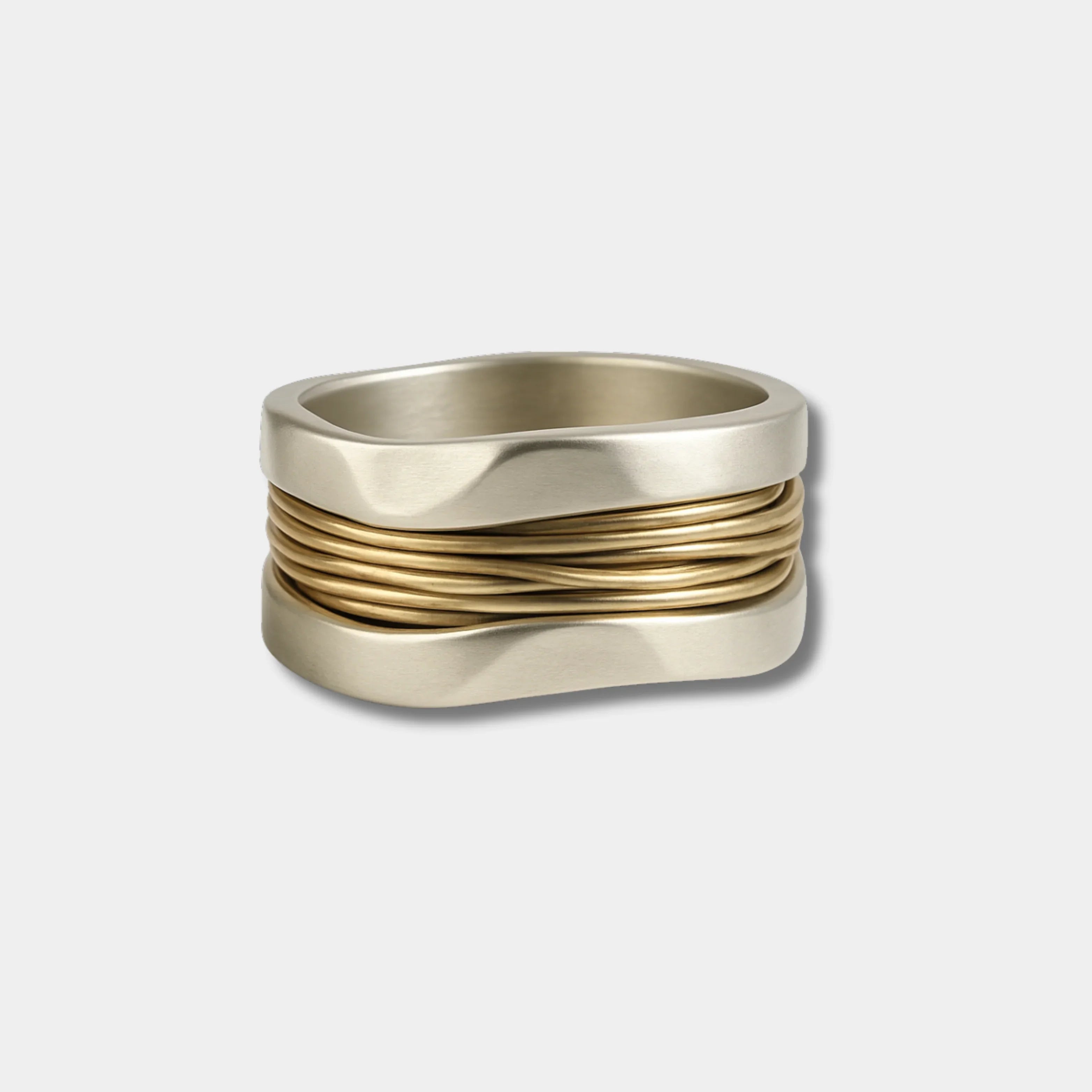 Gold-thread ring with stacked bands, polished silver and thin gold wire rows