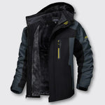 Black winter jacket with yellow zip front and dark hood, faux-fur interior panel