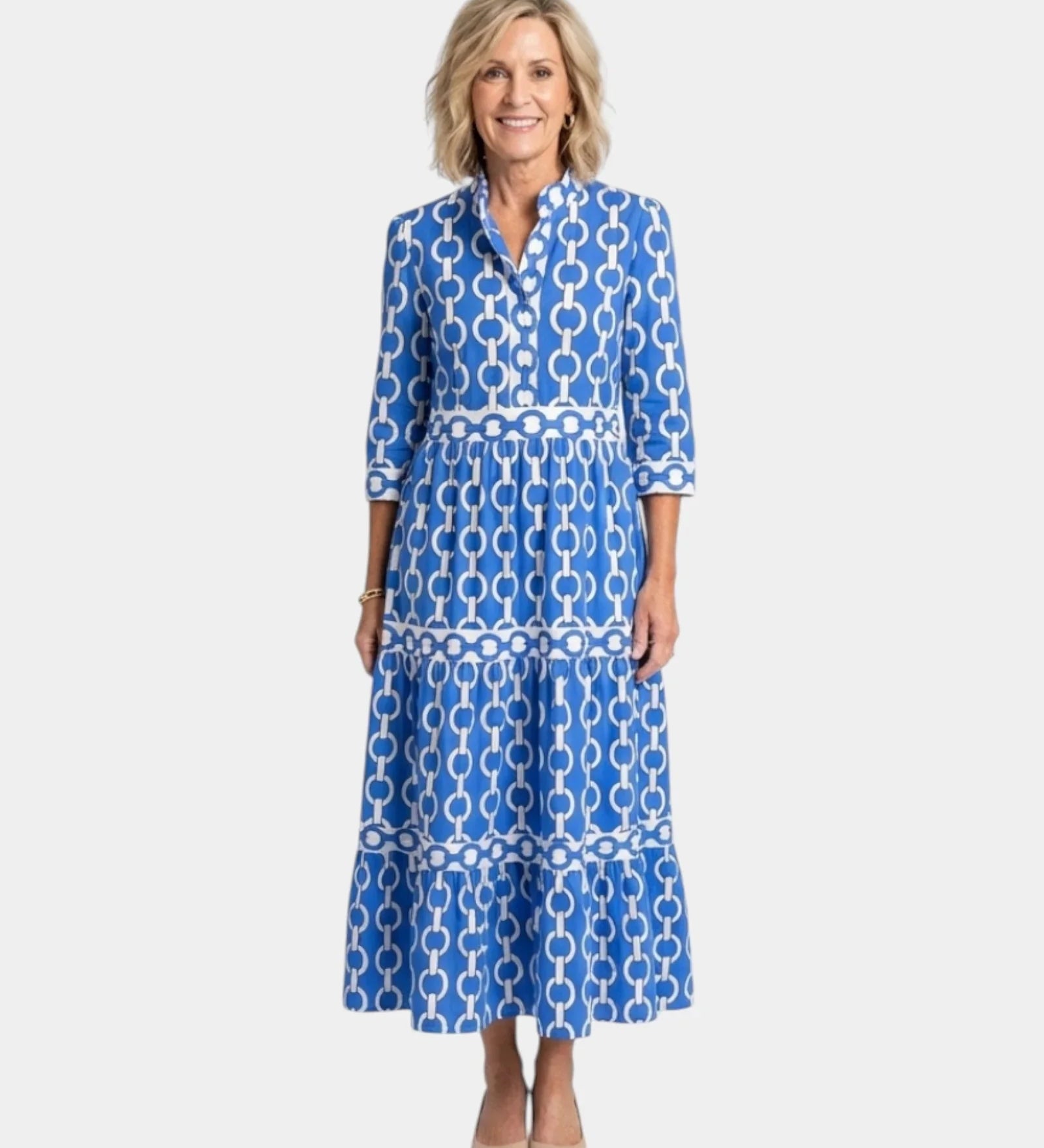 Blue midi shirt dress with three-quarter sleeves, link pattern, button-front and tiered skirt