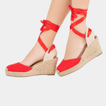 Red high-heel espadrille wedge sandals with crisscross ankle ties