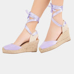 Lilac high-heel espadrille wedges with ankle tie straps and canvas peep-toe