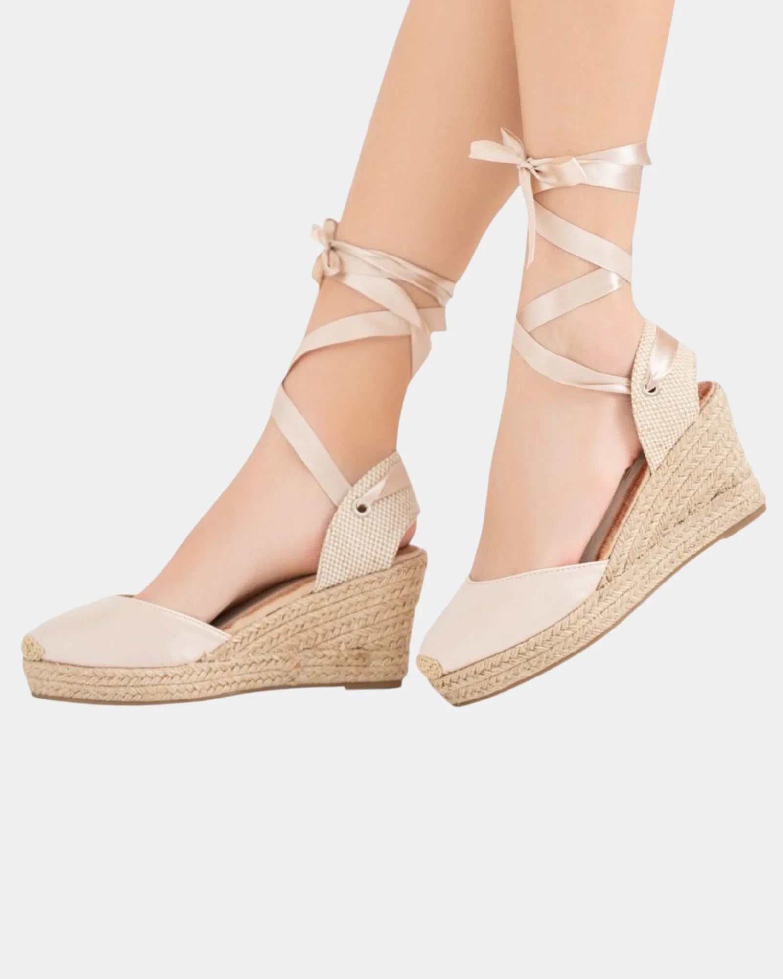 Beige high-heel espadrille wedge sandals with lace-up ankle straps