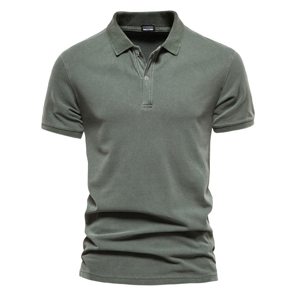 Green polo shirt with short sleeves and quarter-button placket