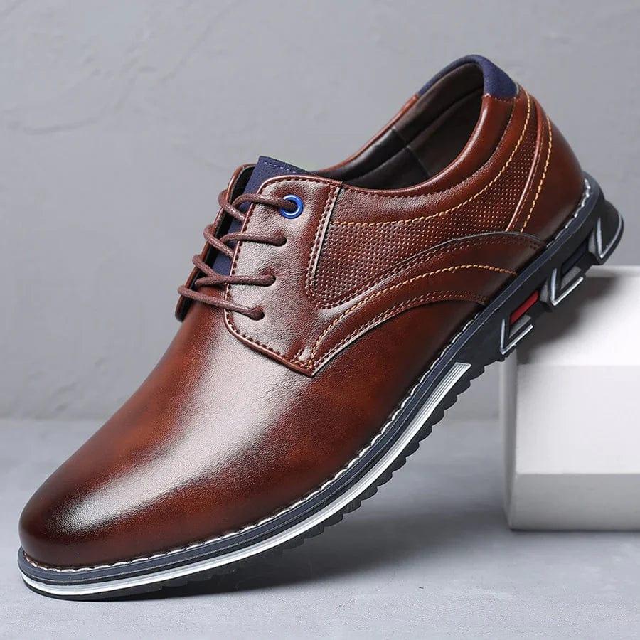 Brown lace-up dress shoes with stitched panels and padded tongue