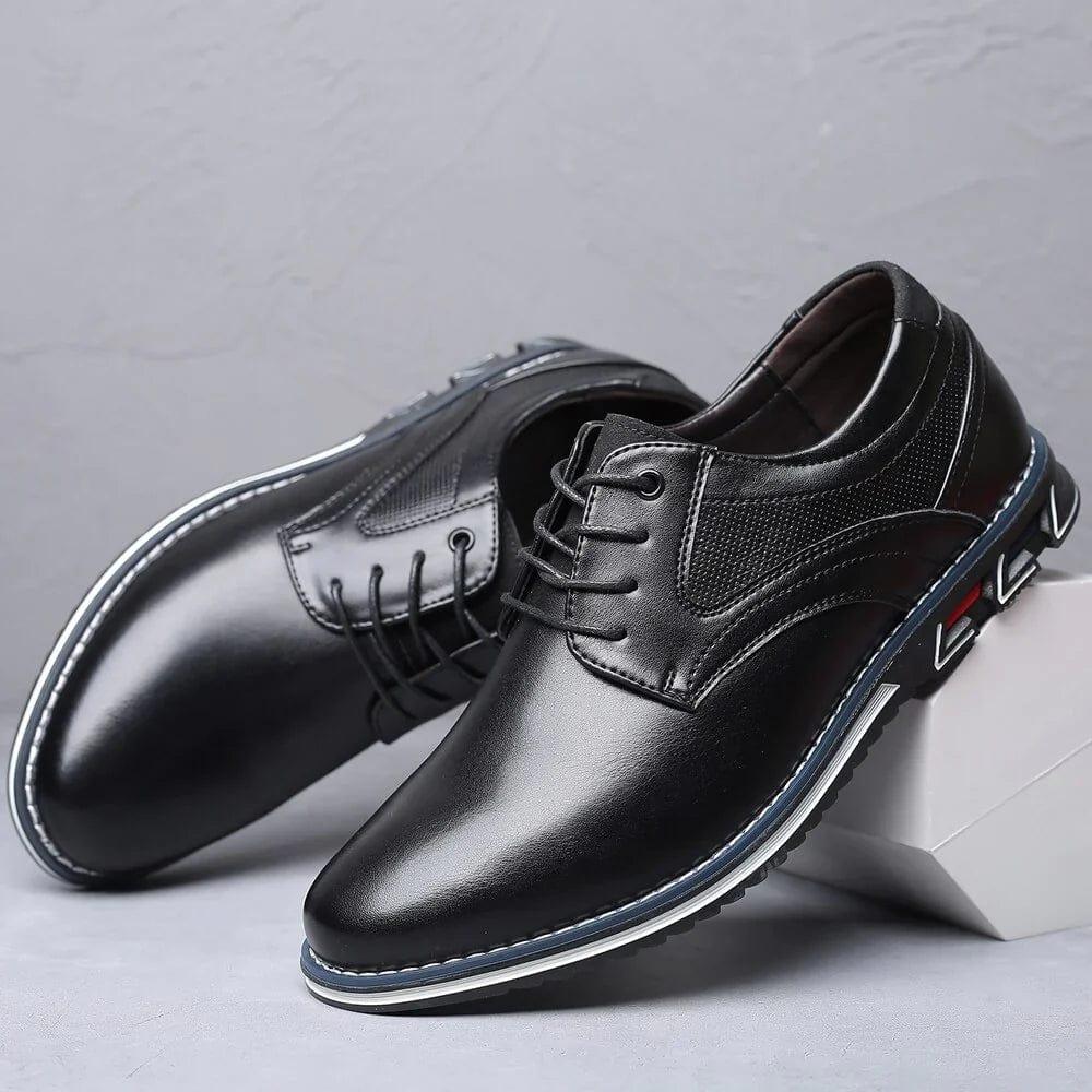 Black lace-up low-profile shoes with textured sole and stitched side panels
