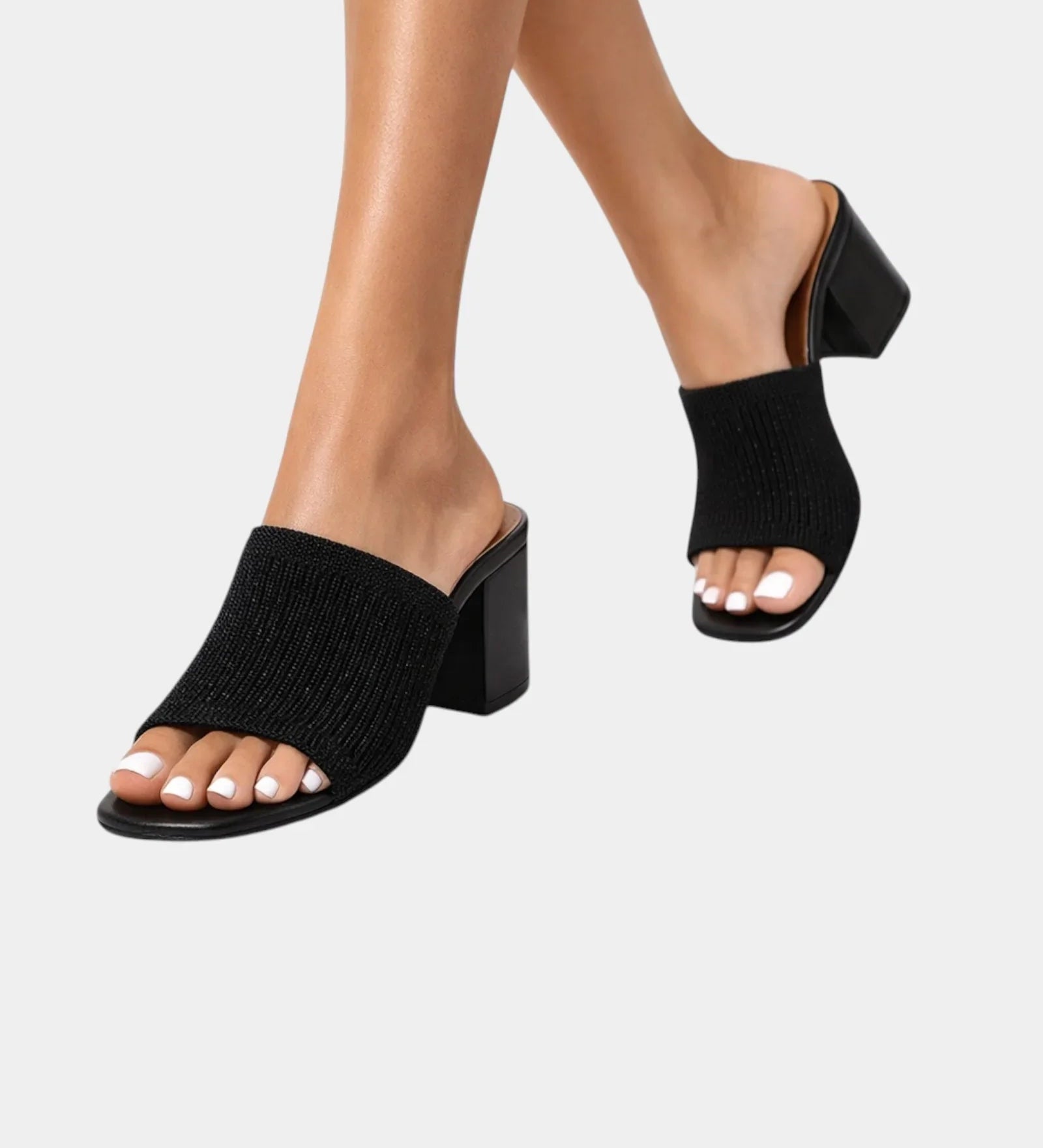 Black block-heel sandals with ribbed knit slip-on straps and open toe.