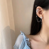 Silver flower ear cuff with small stud and long dangling chain