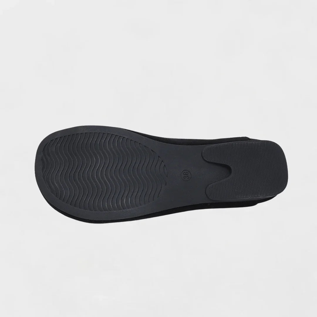 Black loafer outsole with textured tread pattern