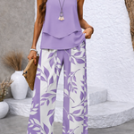 Lilac tiered sleeveless blouse and botanical wide-leg trousers, front side view