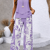 Lilac tiered sleeveless blouse and botanical wide-leg trousers, front side view