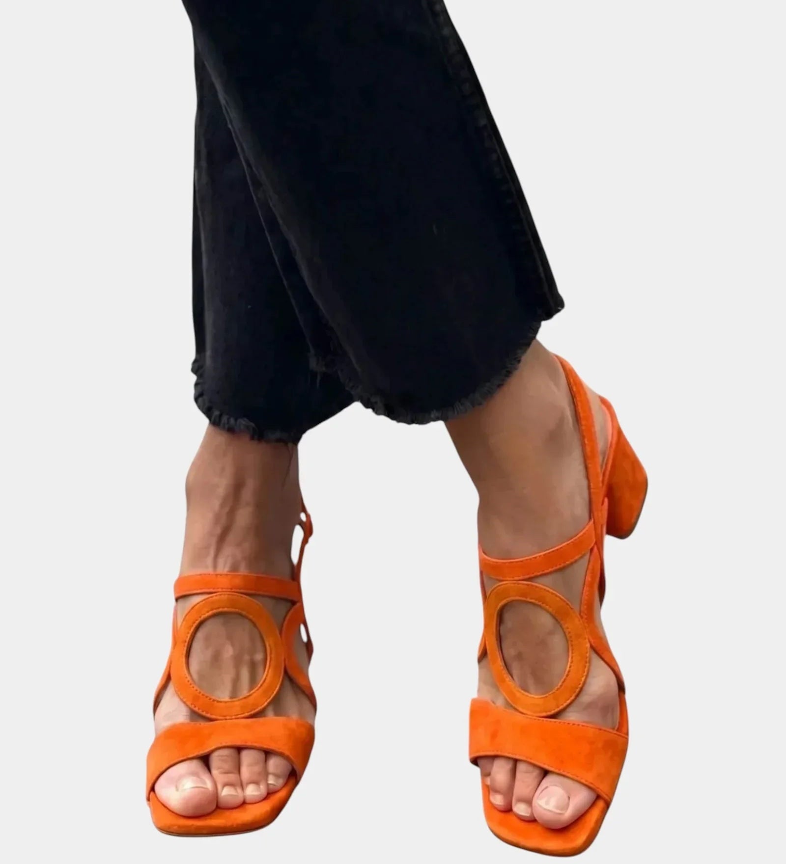 Orange square-toe sandals with rounded cutout straps and ankle buckle