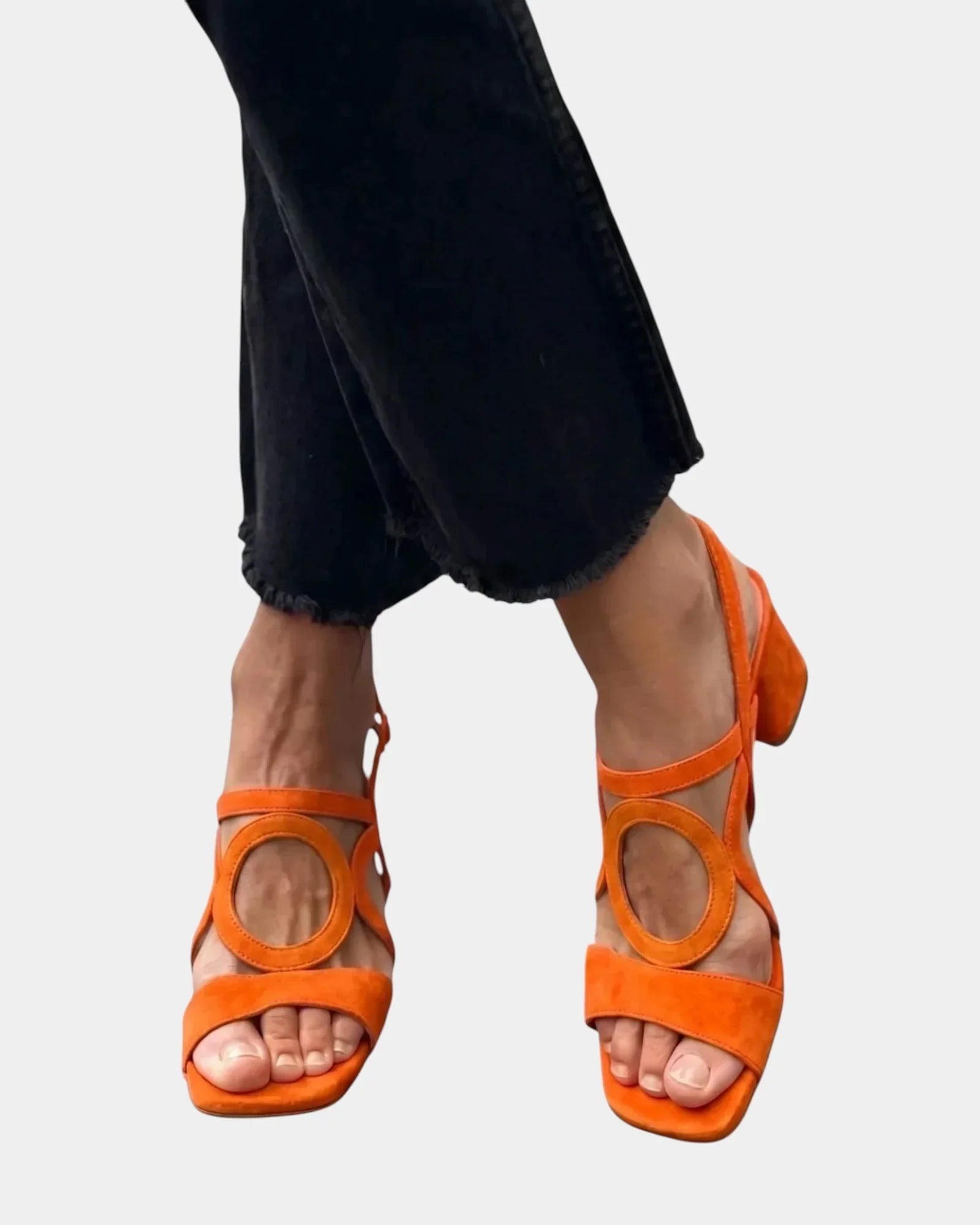 Orange square-toe sandals with rounded cutout straps and ankle buckle