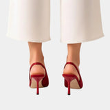 Classic high heels in red with pointed toe and slim heel
