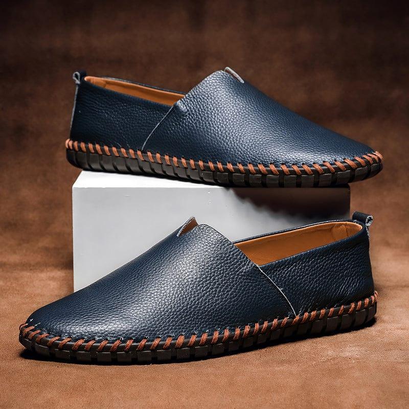 Navy leather slip-on espadrilles set with jute midsole and orange stitched edge
