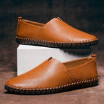 Cognac leather slip-on espadrilles set with jute midsole and orange stitched trim