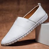 White leather slip-on espadrilles with jute sole and white stitched trim