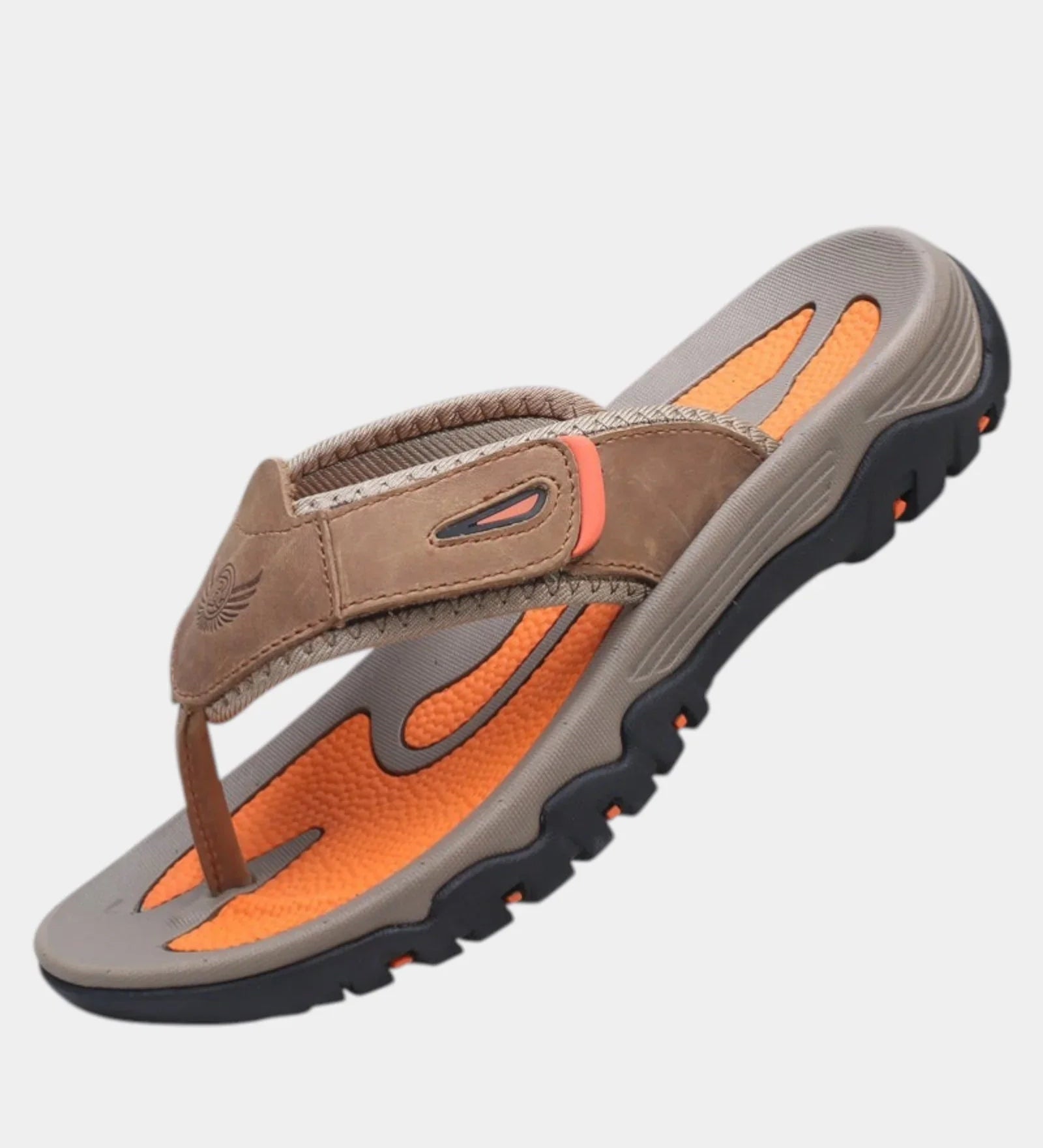 Brown leather slide sandals with orange footbed and chunky gray rubber sole