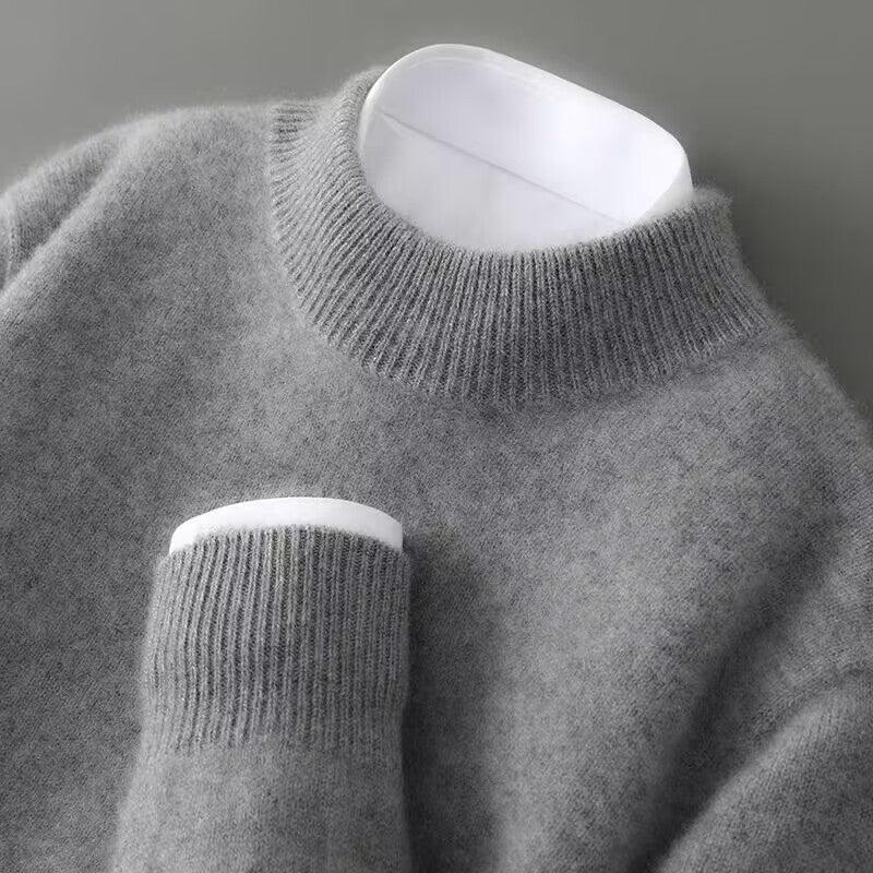 Elegant heather gray cashmere sweater with crew neck and ribbed cuffs