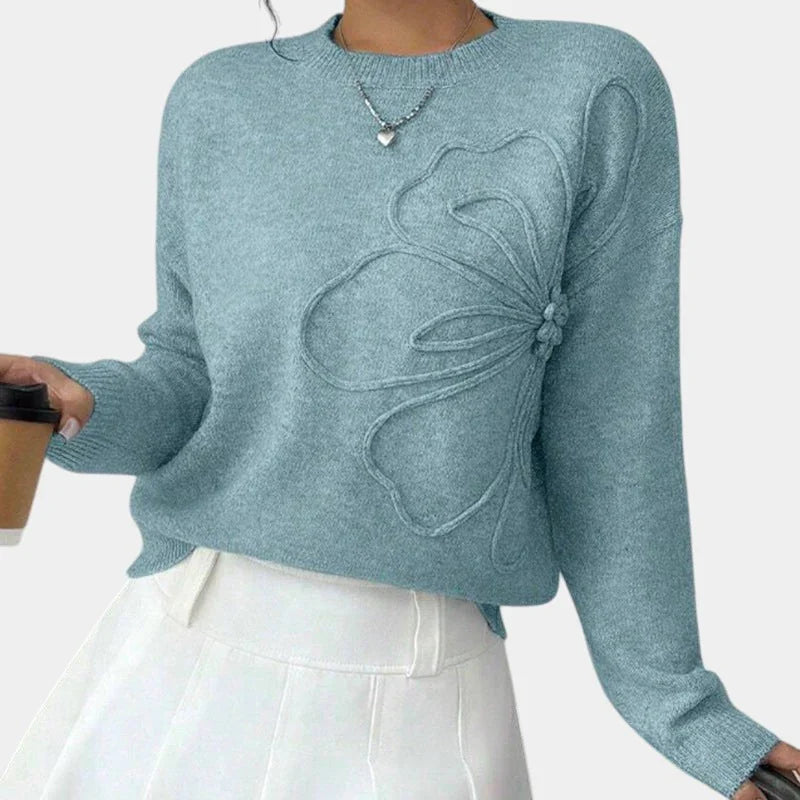 Blue-green knitted flower sweater with crew neck, long sleeves, and raised 3D floral motif