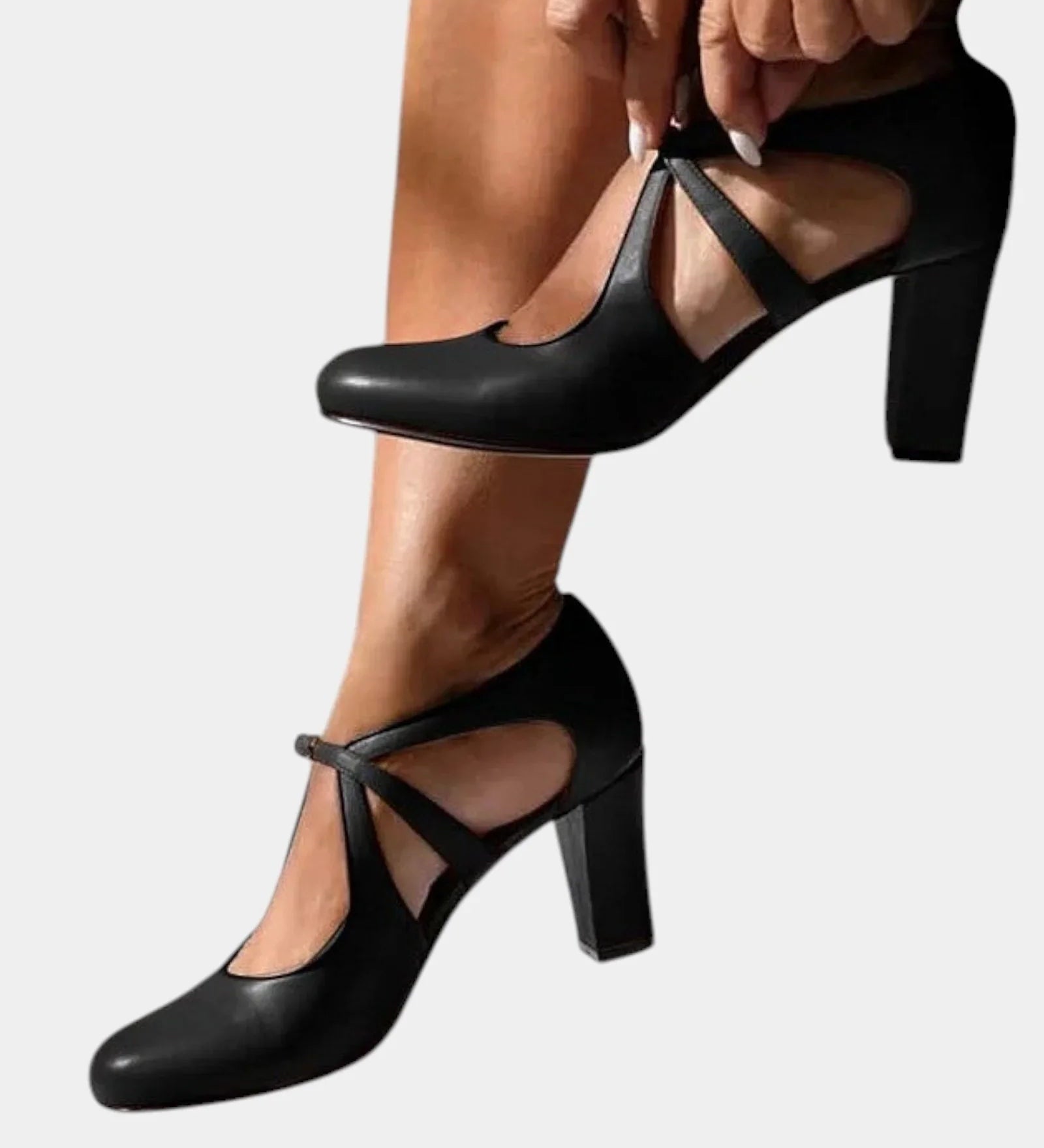 Black heeled slingback pumps with thin ankle tie straps and pointed toe