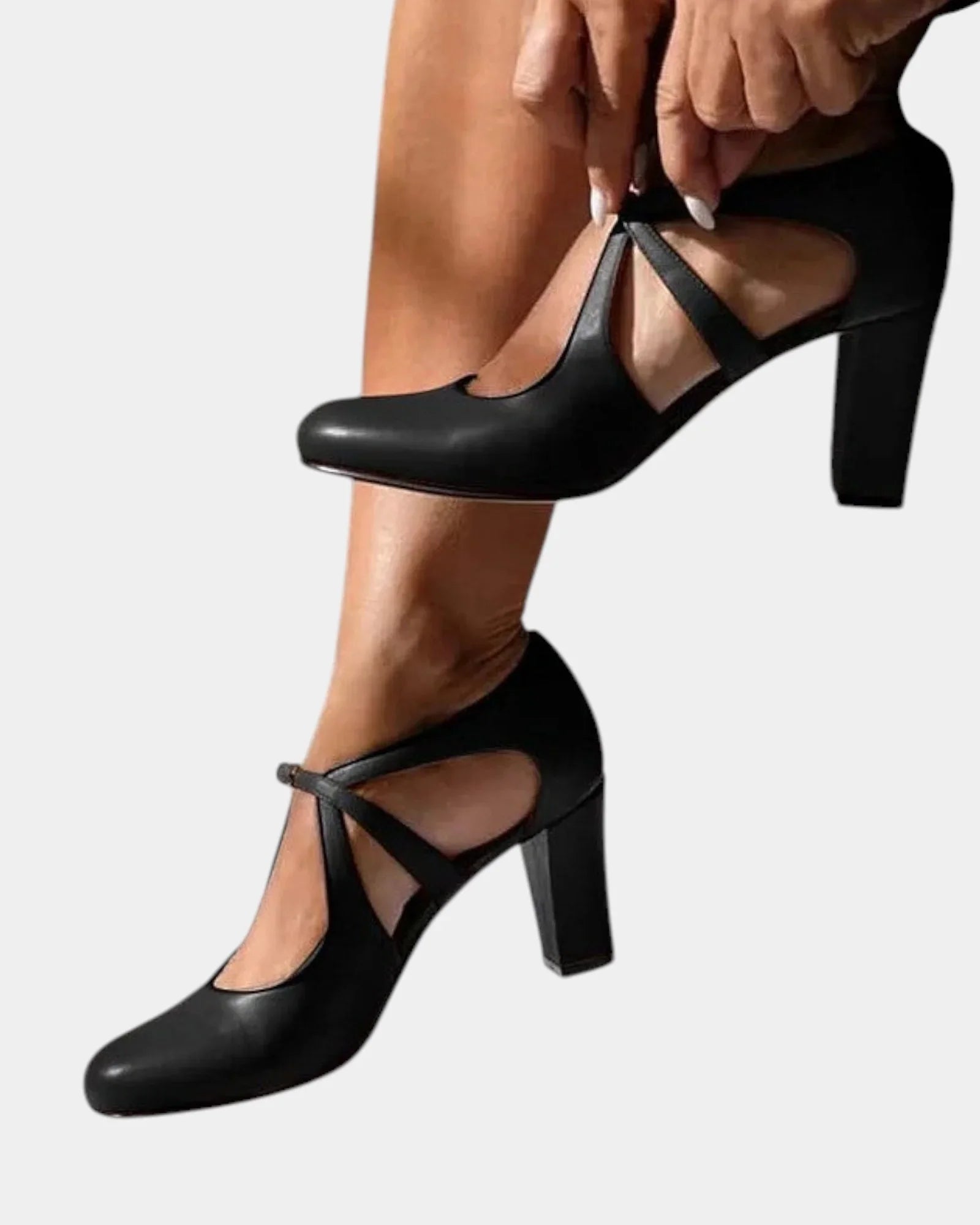 Black heeled slingback pumps with thin ankle tie straps and pointed toe