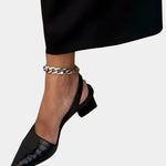 Black slingback block heels with ankle chain detail and pointed toe