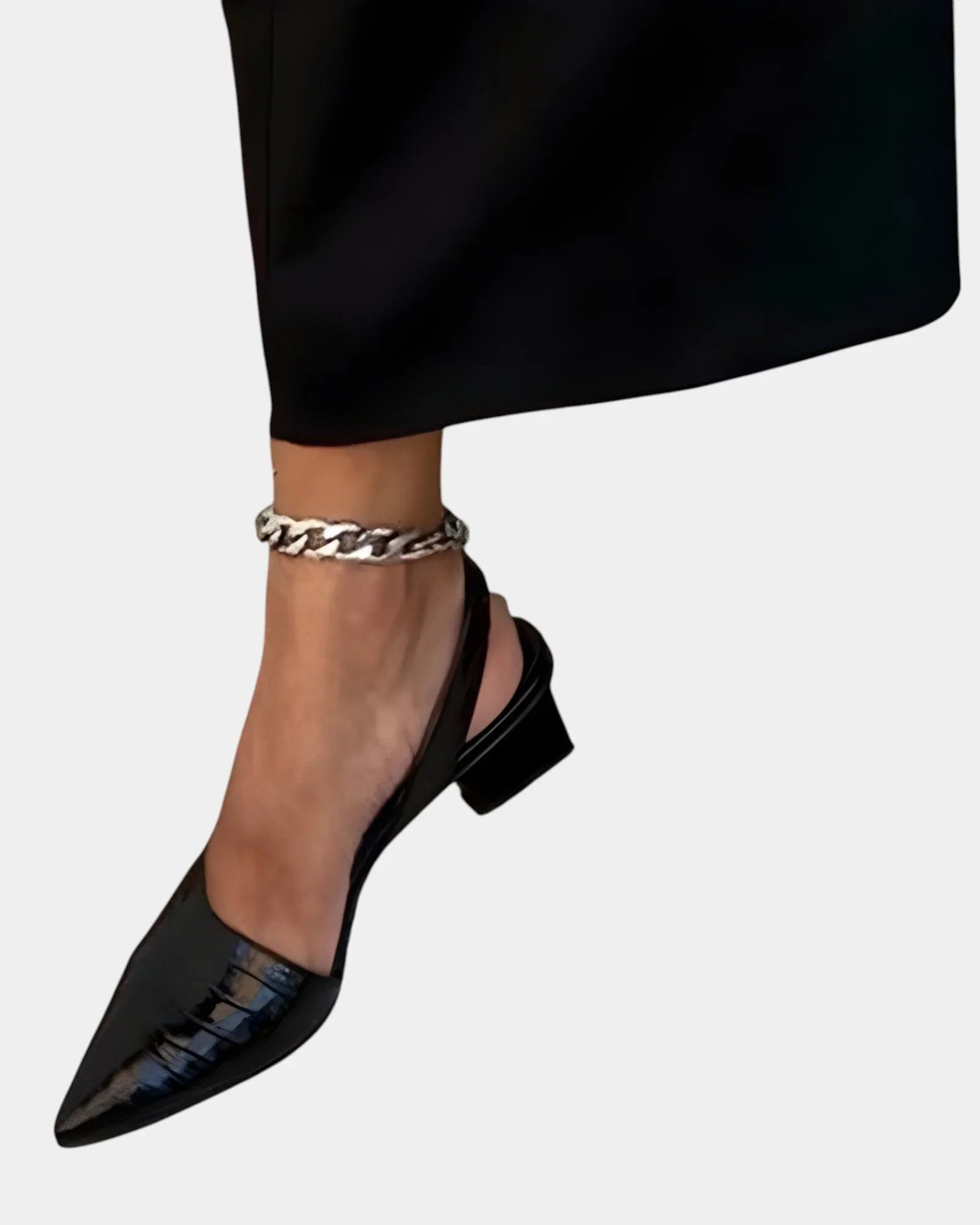 Black slingback block heels with ankle chain detail and pointed toe