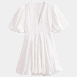 Anastasie | Mini dress with embroidered details and ruffled sleeves