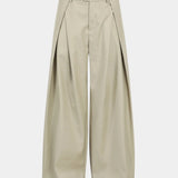 Beige wide-leg trousers, front view with button waistband and belt loops