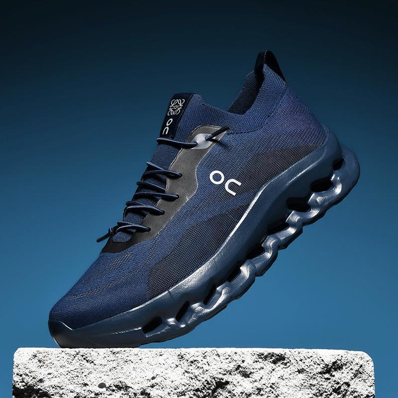 Navy blue lace-up performance sneaker with chunky pod sole and OC logo