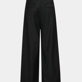 Black wide-leg trousers with patch pockets on front and button waistband