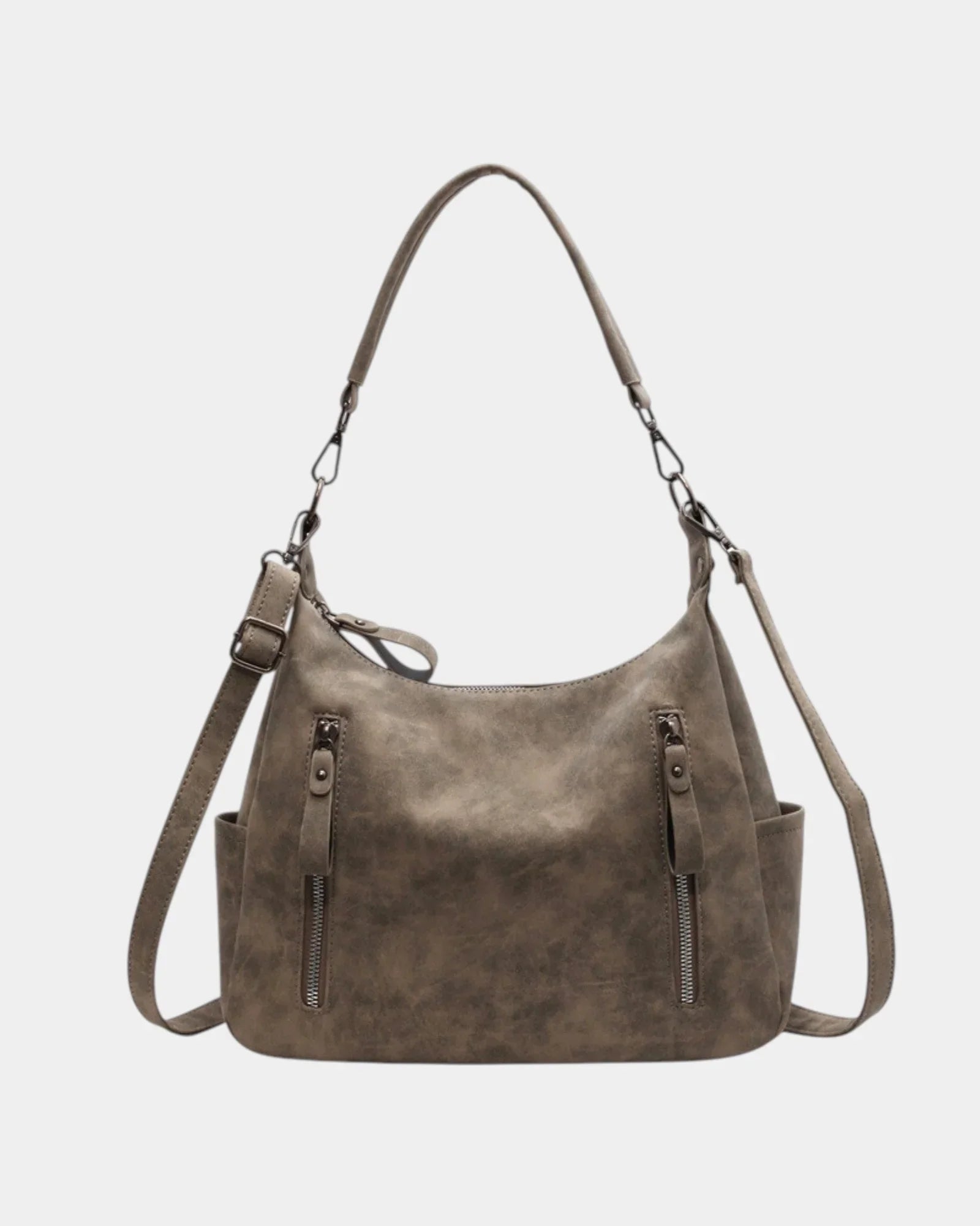 Textured brown shoulder bag with long straps, top handles, and two zip pockets