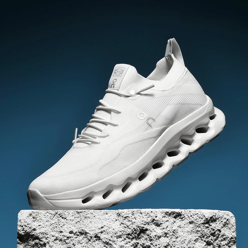 White lace-up performance sneaker with pod outsole and OC logo