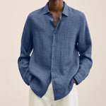 Blue linen-look long-sleeve button-up shirt with pointed collar.