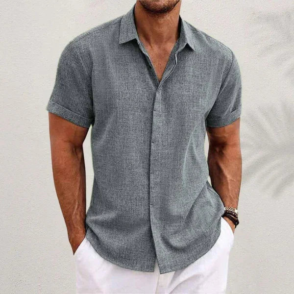 Gray short-sleeve button-up summer shirt with pointed collar and chest pocket detail.