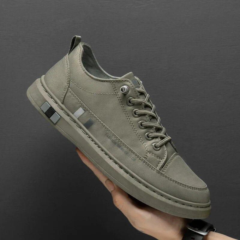 Olive green lace-up orthopedic shoes with side stripe and thick sole