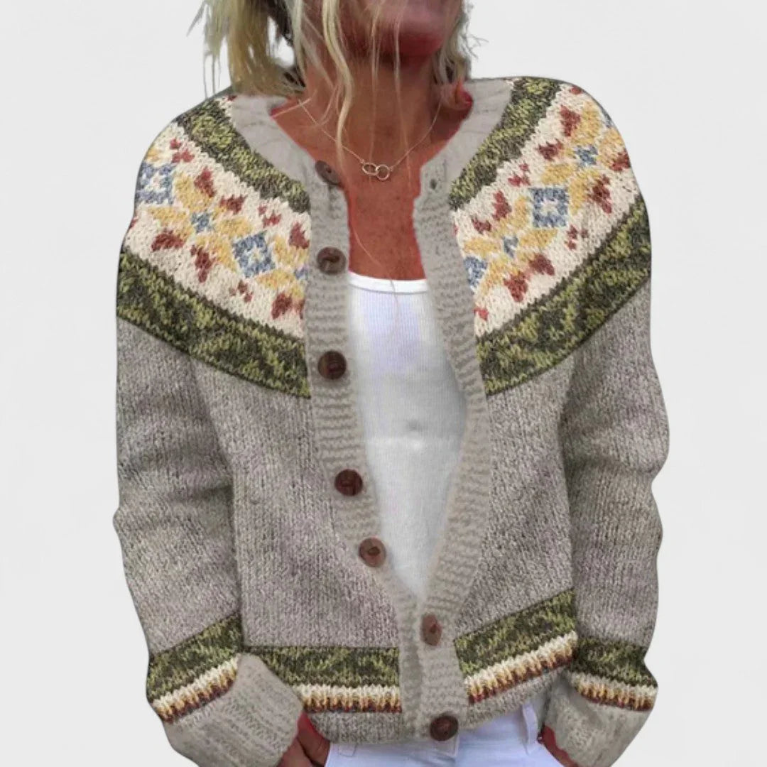 Light gray knit cardigan with fair isle yoke, multicolor stripes, button front