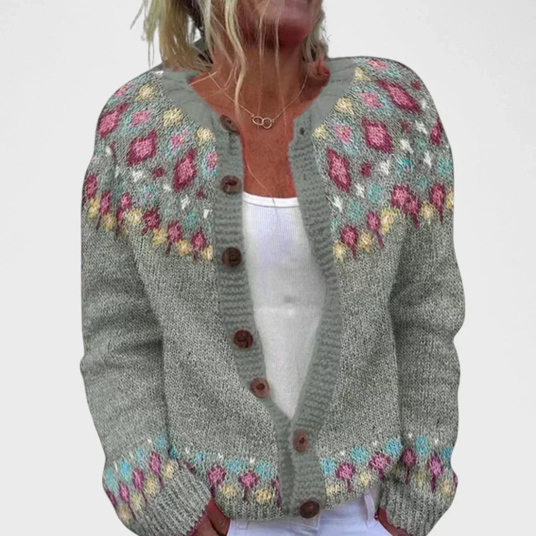 Gray knit cardigan with multicolor stitched motifs and button front