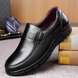 Black slip-on dress shoe with textured upper and chunky non-slip tread outsole